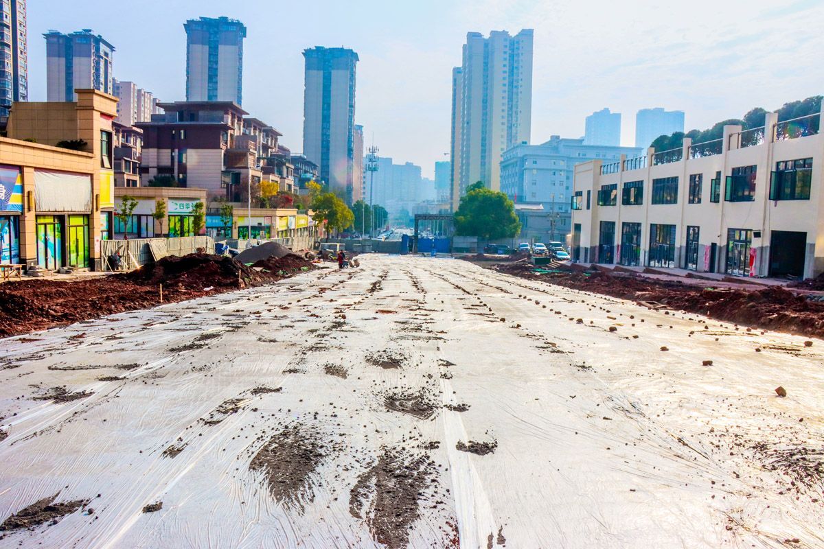 达城永兴路西延线道路完成水稳层施工